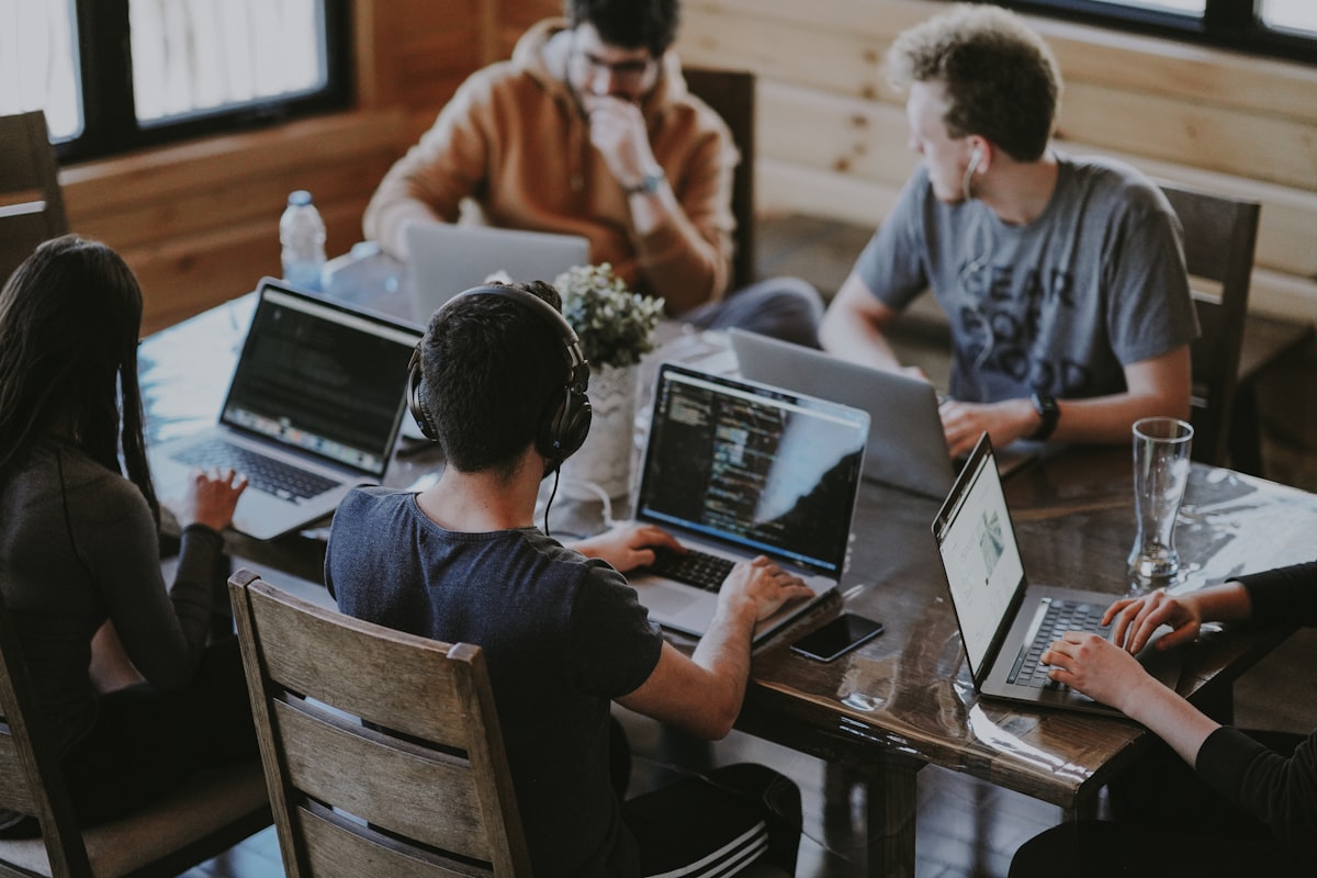 Founders working together around a table