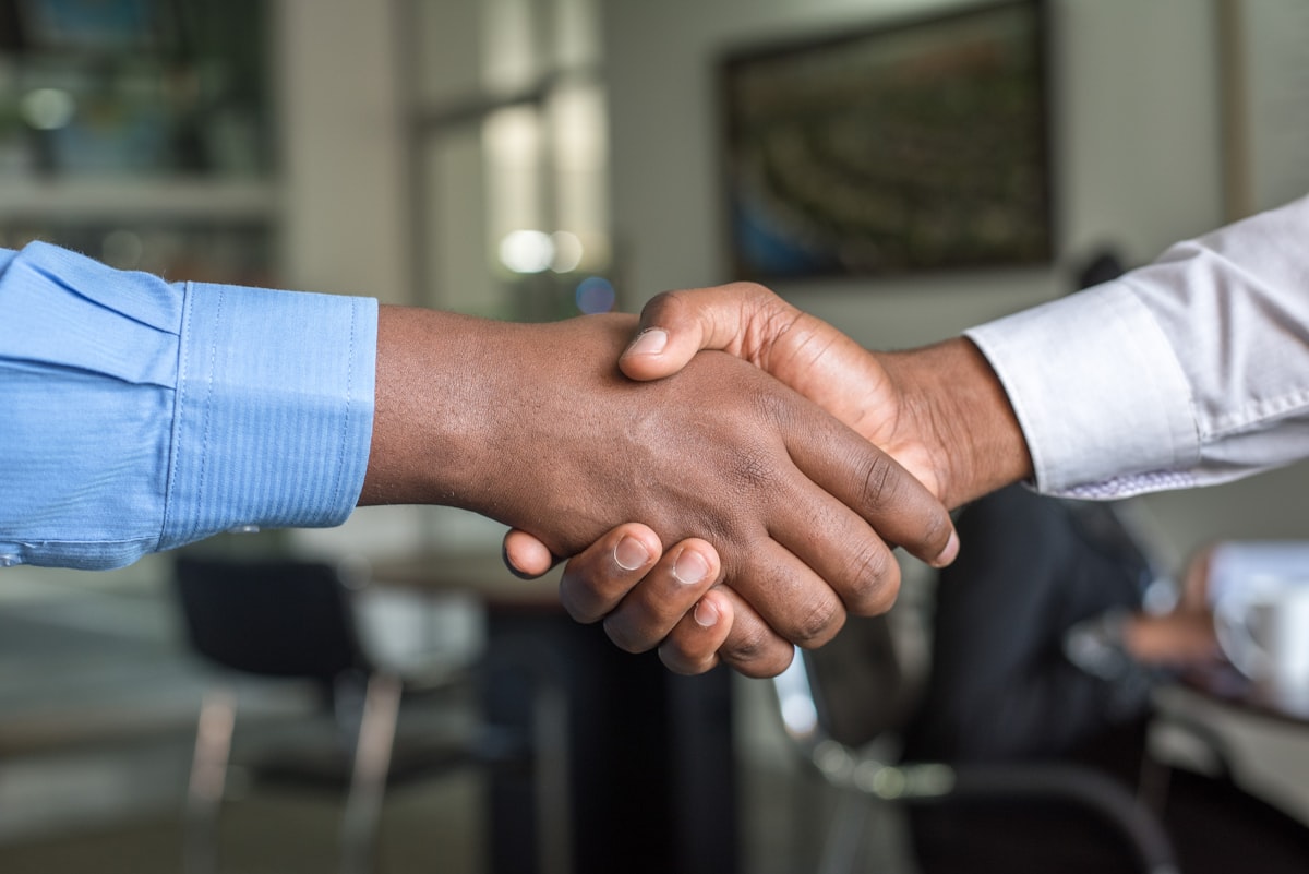 A handshake sealing the partnership